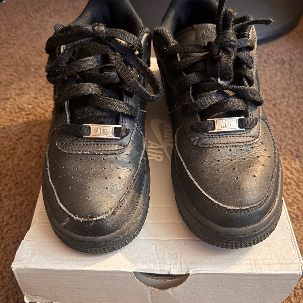 Nike Air Force 1 Grade school size 5 (equivalent to a women’s size 7)